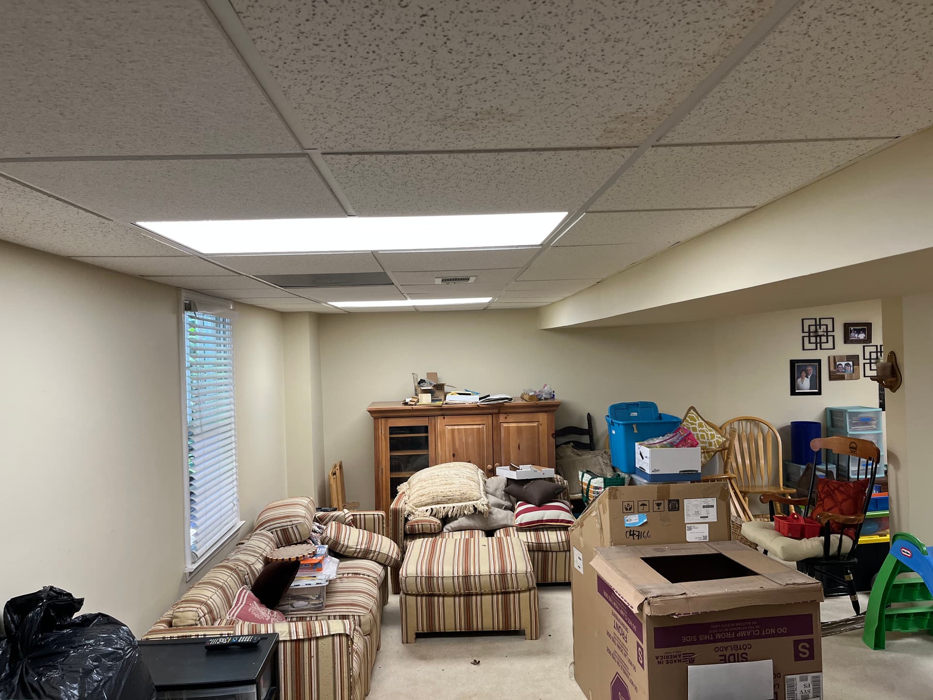 Dead Fluorescent Fixtures Replaced in a Finished Basement Playroom