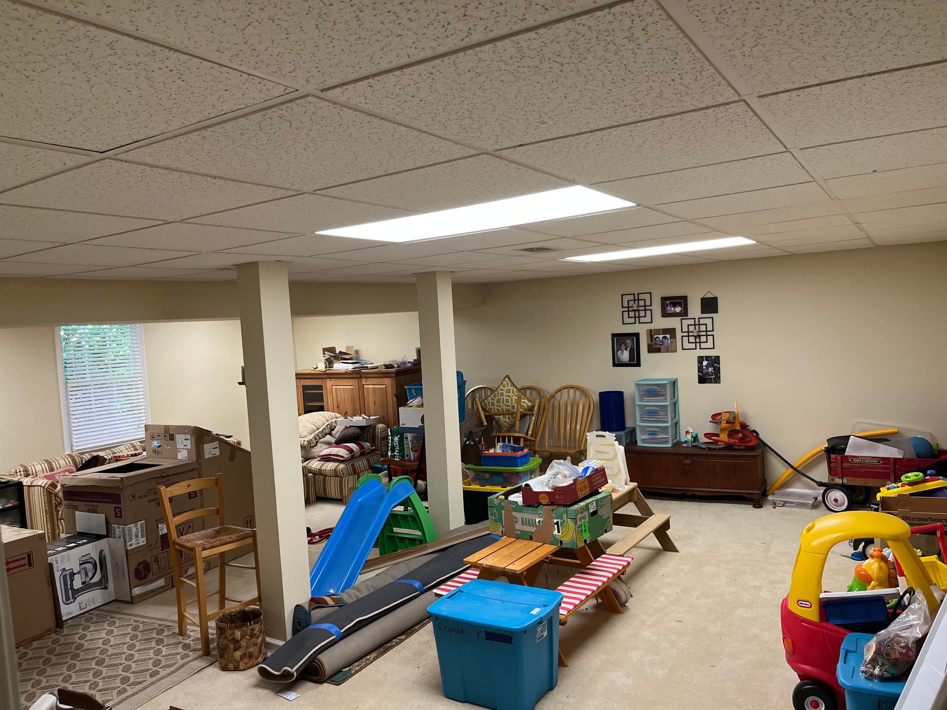 Dead Fluorescent Fixtures Replaced in a Finished Basement Playroom