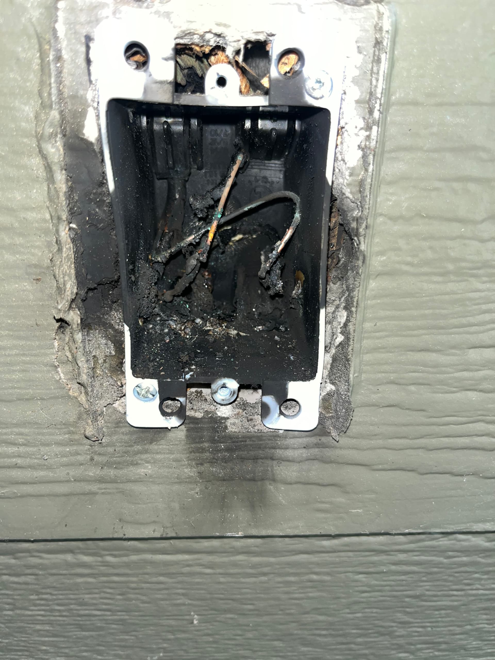 Gallery photos for Lightning Strike Destroyed This Outdoor GFCI Outlet - Here's What We Found: Image #1