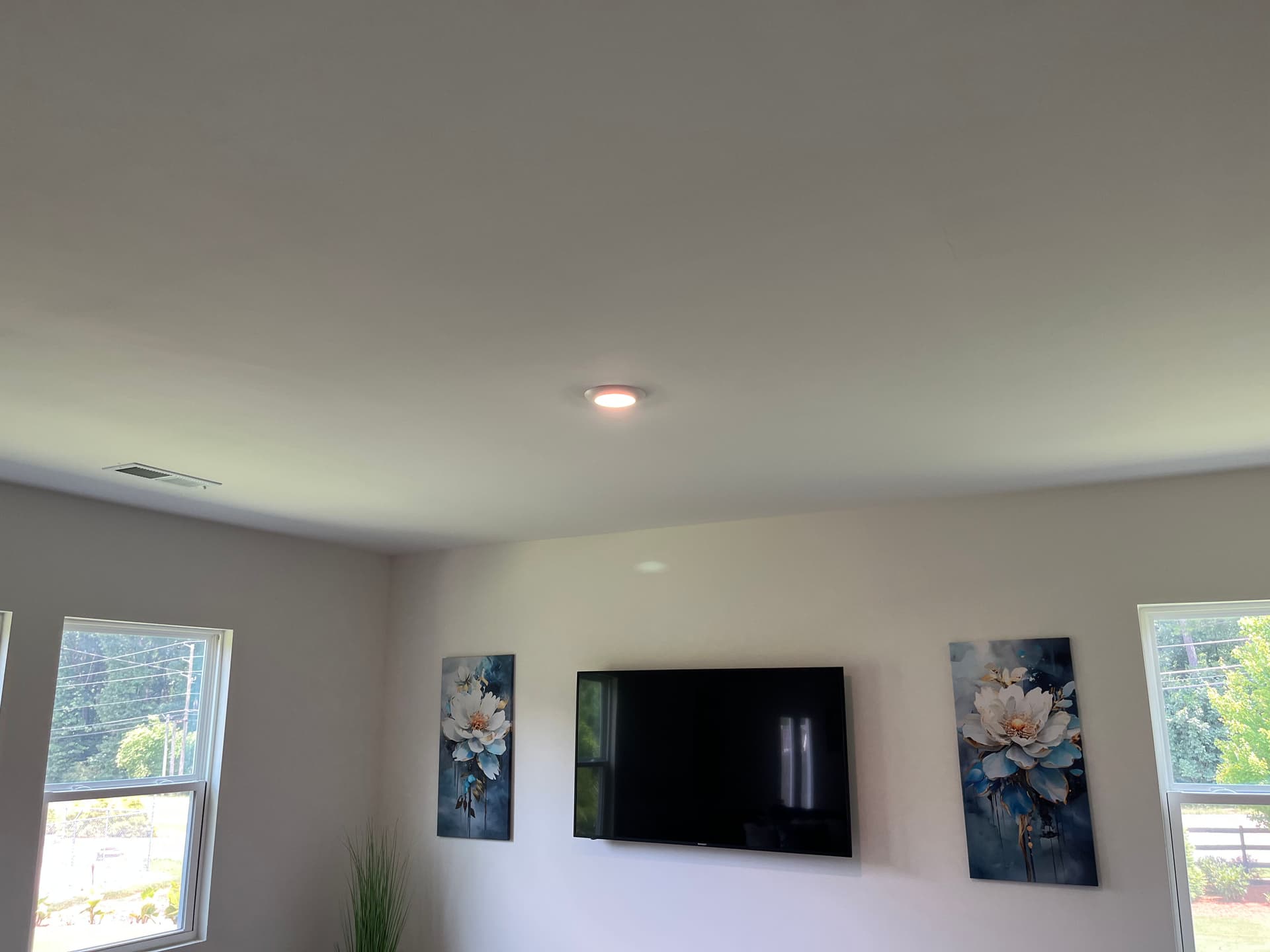 Builder-Grade Fixture Swap Nets a Big Living Room Upgrade image