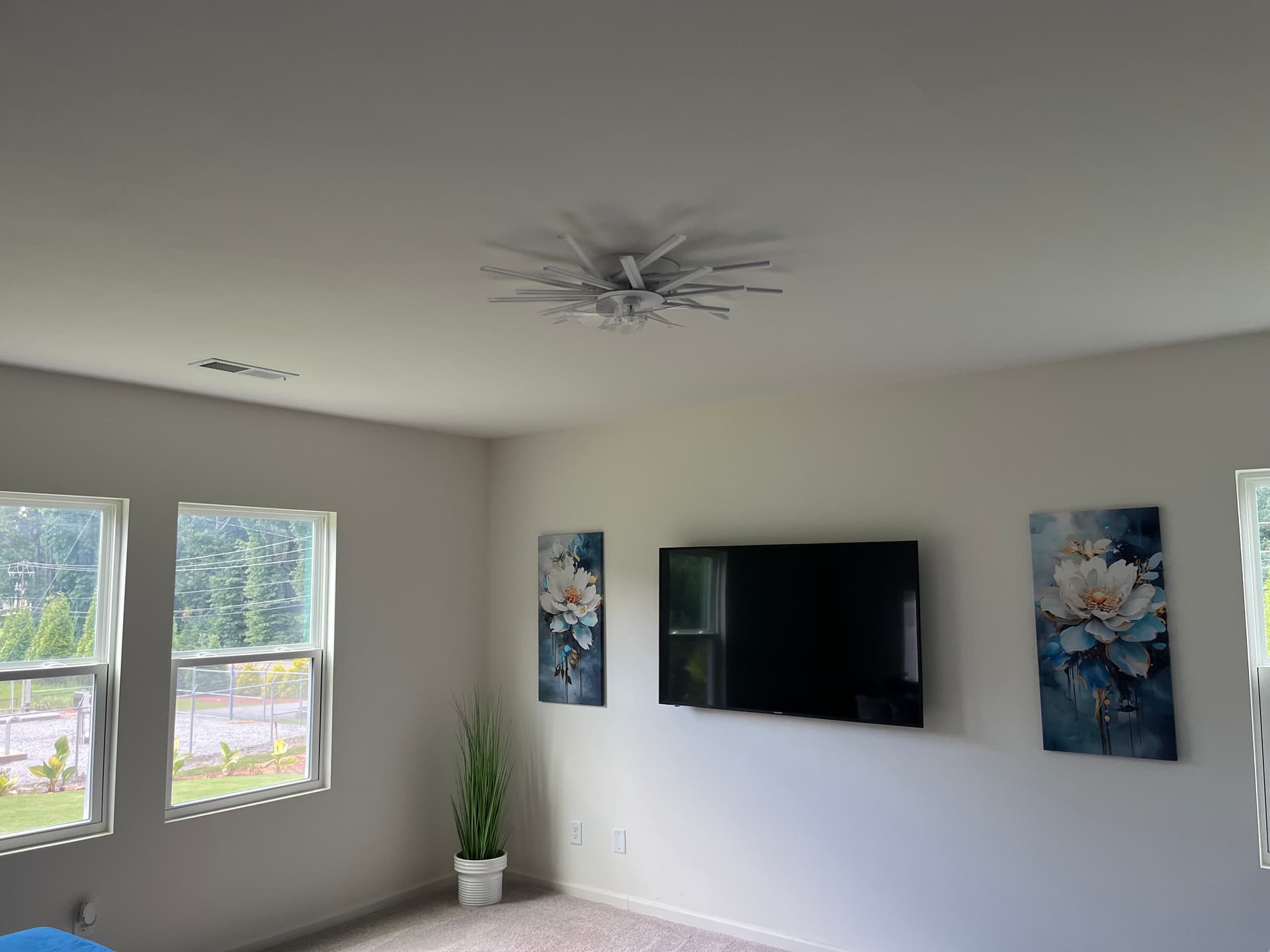 Gallery photos for Builder-Grade Fixture Swap Nets a Big Living Room Upgrade: Image #1